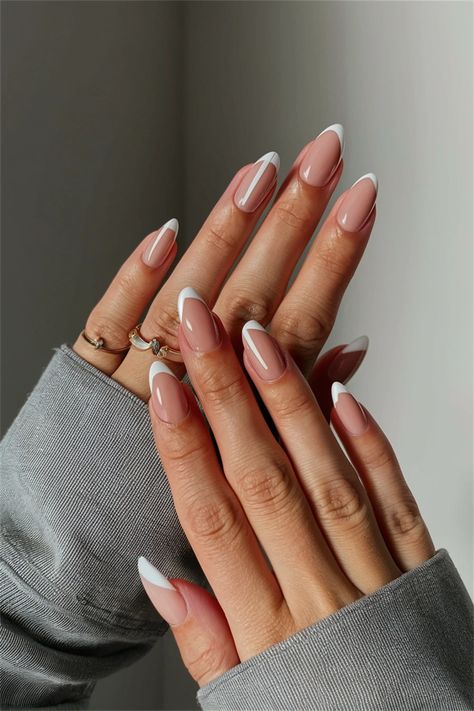 Looking for simple nail ideas that enhance your natural nails? Try a chic nude base with a delicate white line art design on the tips. This minimalist approach adds a touch of elegance while showcasing the beauty of your natural nails. Perfect for any occasion, these nails are both stylish and low-maintenance, making them ideal for the busy individual. Discover the beauty of simplicity! Nail Ideas For Natural Nails, Ideas For Natural Nails, Nail Art Simple Elegant Natural, Simple Nail Ideas, White Line Art, Line Art Design, Simple Nail, White Line, Elevate Your Look