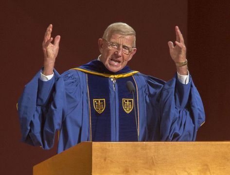 Lou Holtz returns to Notre Dame for commencement address | Notre Dame Insider Football | ndinsider.com Lou Holtz, Catholic Education, Leadership Programs, Red Chair, Golden Hair, Brass Band, Football Coach, Blue Gown, Trumpets