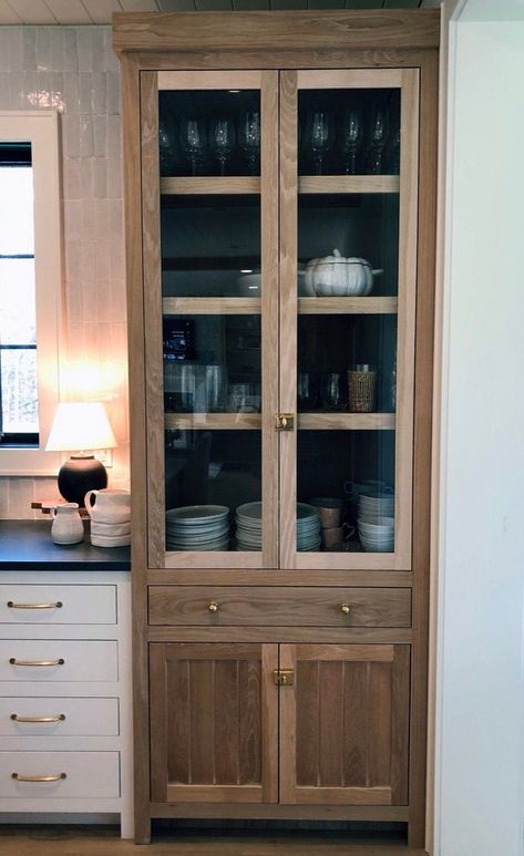 This is a gorgeous solid white oak kitchen hutch that was built in our shop for one of our clients. We are able to replicate this piece or modify the design to your liking. It has solid white oak shelves, three up top and one in the lower cabinet. The hardware is not included except for the soft close hinges, and soft close undermount drawer slides. The drawer is made of solid white oak all dovetail construction. The finish is a distressed, white pickling that has been scraped and finished in a Built In Kitchen Hutch, White Oak Kitchen Cabinets, Built In China Cabinet, Storage Hutch, White Oak Kitchen, Oak Kitchen Cabinets, Twin Lakes, China Cabinets, Oak Kitchen