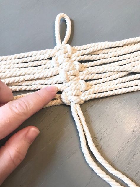 Over the last few years I have been watching Macrame home decor gain in popularity. Have you ever seen a piece and thought, I bet I could make that. But then had no clue how to start? I’ll show you a quick and easy Macrame palm leaf or feather that you can make today! Supplies First, let’s gather our supplies•5mm natural 100% cotton, macrame 3 strand twisted cording•wood beads•fabric stiffening spray•Scissors•measuring tape•spray painr•Hair CombSpray paint your beads. I used one… Macrame Tutorial Beginner, 3 Strand Twist, Concrete Bird Bath, Macrame Home, Beads Fabric, Easy Macrame, Cord Wood, Fabric Stiffener, Macrame Home Decor