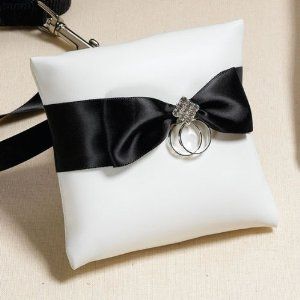 A long black ribbon is attached to the back of the pillow. Simply tie the black band around the shoulders and onto your dog's leash and watch your dog march proudly down the aisle.... Dog Ring Bearer Ideas, Dog Ring Bearer Pillow, Ring Bearer Ideas, Dog Wedding Accessories, Dog Ring Bearer, Ring Bearer Dog, Lillian Rose, Rosé Dog, Teal Ribbon