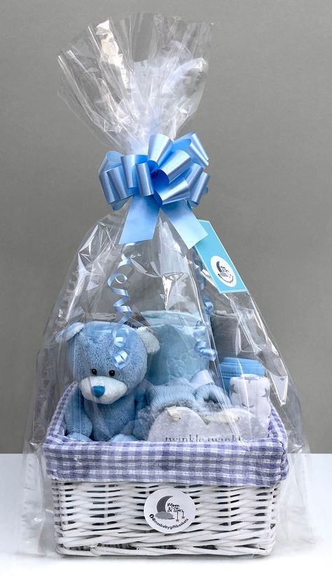 All of our blue baby boy gift baskets are presented in cellophane gift wrap and are hand-finished with a decorative blue bow and curled ribbon. Baskets Christmas, Baby Boy Gift Baskets, Baby Gift Baskets, Basket Gifts, Idee Babyshower, Baby Shower Baskets, Baby Shower Gift Basket, Cadeau Baby Shower, Diy Baby Gifts