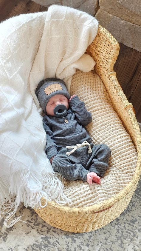 Cork engraved name tag on a cuff beanie with a matching ribbed top and pant set. If you do not select a font, font 15 will be used. (example photos) These do run a bit big to accommodate the shrinking in the first wash/dry. The newborn fits 7.5-10lbs If your looking for an outfit without snaps in-between legs, check out our fold over waist 3peice bamboo set or our knotted hat waffle set! If you are on a time crunch, please message me before ordering! I do my best to get items out as quickly as p Newborn First Outfit, Newborn Hospital Outfit, Baby Boy Coming Home Outfit, Kids Goals, I Want A Baby, Beanie Outfit, Newborn Baby Boy Outfit, Baby Wishlist, Really Cute Puppies