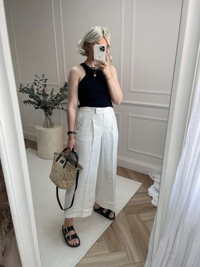 AD Cropped white linen trousers, styled with black racer vest, black Birkenstock’s. Love this easy but smart chic look for summer! Outfit from Amazon Fashion @amazonfashion #founditonamazon #StyledItWithAmazon @liketoknow.it #liketkit http://liketk.it/3dDe1 White Birkenstock Outfit Summer, Birkenstock Outfit Spring, White Birkenstock Outfit, Cropped Trousers Outfit, Birkenstock Outfit Summer, Linen Trousers Outfit, White Linen Pants Outfit, Looks For Summer, Laura Byrnes