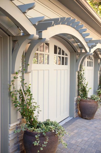 Add a finishing touch to your garage door with a pergola like this one with arched brackets by Three River Stone. Garage Pergola, Garage Door Design, Casa Country, Pergola Design, Pergola Plans, Makeover Ideas, Door Makeover, Garage House, Garage Design