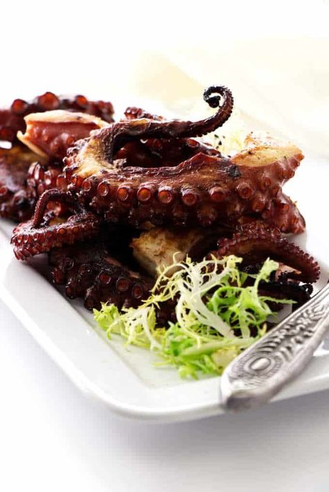 Tender and crispy grilled octopus served with a tangy preserved lemon vinaigrette and roasted potatoes. Enjoy this Spanish-style grilled octopus the easy delicious way.#grilledoctopus #appetizer #spanishrecipes #savorthebest Spanish Octopus Recipe, Spanish Octopus, Roasted Octopus, Octopus Recipe, Yummy Nummies, Octopus Recipes, Spanish Appetizers, Chicory Recipe, Roasted Fingerling Potatoes