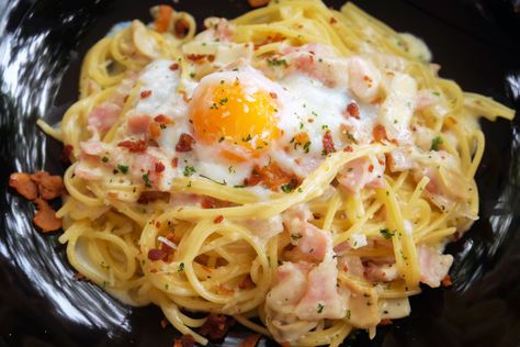 Ingredients12 oz spaghetti6 eggs8 slices thick cut hickory smoked bacon, cut ½ inch strips4 tablespoons olive oil, plus extra4 shallots, diced, about 1 cup3 garlic cloves, minced1/2 teaspoon sweet paprika1/2 cup fresh parsley, chopped1 cup dry white wine (may use chicken broth)1 cup freshly grated Parmigiano Reggiano cheeseBlack pepper and sea saltOptional: 1/4 Pasta With Egg Yolk, Pasta With Egg, Carbonara With Egg, Frozen Zucchini, Cod Dishes, Ways To Heal, Carbonara Pasta, Egg Recipe, Spaghetti Carbonara