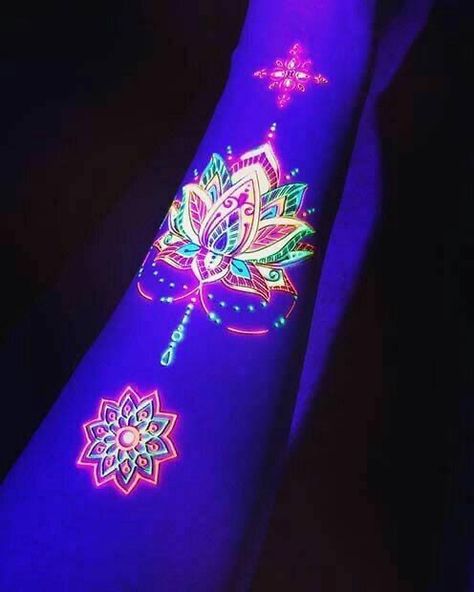 Glowing Tattoos, Uv Ink Tattoos, Tattoo Colors, Glow Tattoo, Black Light Tattoo, Lotus Tattoos, Neon Tattoo, Uv Tattoo, Party Tattoos