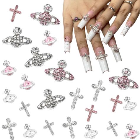 PRICES MAY VARY. Package Included: You will get 32 pcs white pink cross & planet nail charms with crystal rhinestone, a total of 8 styles in 2 colors, 4 in each style. Enough quantities to meet your nails daily design needs, make your nail to be charming, which can easily match your style and meet your daily needs. Exquisite Design: The nail charms are saturn and cross shape, the glittering diamond is inlaid in the middle of the silver metal base. It is definitely a hot spot for fashion ideas fo Nail Art White Base, Cross Charm Nails, Chrome Nails With Cross Charms, Nails W Cross Charms, Pink Planet Charm Nails, Cross Nail Charm Nails, Nails Cross Charm, Nail Art Jewels, Rosary Nails