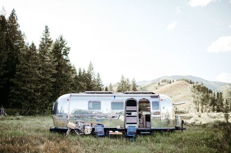 1971 Airstream Overland International Remodel by Traverse Design + Build - Dwell Airstream Caravans, Green Appliances, Retro Trailer, Airstream Remodel, Airstream Interior, Airstream Renovation, Maple Floors, Caravan Interior, Metal Siding