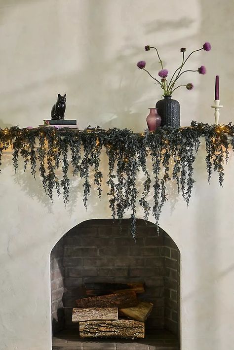 Halloween Décor & More | Anthropologie Halloween Decorations Indoor Minimalist, Practical Magic Decor Inspiration, Halloween Decor Fireplace, Black Fall Decor, Room Decor Elegant, Halloween Living Room Decor, Whimsigoth Aesthetic, Living Room Decor Elegant, Halloween Mantle Decor