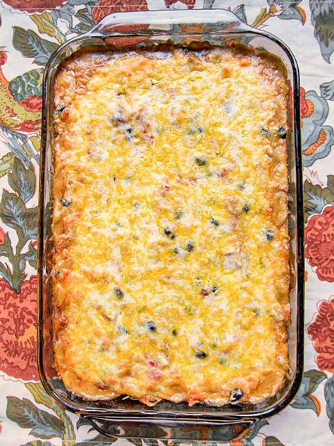 Chicken Tortilla Casserole - our favorite Mexican chicken casserole! Corn tortillas, cream of chicken soup, sour cream, Rotel, black beans, taco seasoning, chicken, and cheese. Only takes a minute to assemble and it is on the table in 30 minutes. Everyone cleaned their plate and went for seconds. Great casserole for a potluck. Can also freeze for later. Quick, easy, kid-friendly, and delicious! Mexican Corn Tortilla Casserole, Mexican Chicken With Velveeta, Recipes To Use Corn Tortillas, Chicken Taco Casserole With Tortillas, Mexican Dump Casserole, Loaded Chicken Burrito Casserole, Mexican Chicken Casserole With Fritos, Cheesy Chicken Tortilla Casserole, Chicken Tortilla Dump Dinner