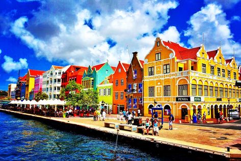 This is a picture taken in the island of Curacao 🇨🇼⁣ ⁣ Fun Facts: United States Currency is Welcome Everywhere on Curaçao. For U.S. visitors, there is no need to exchange money when traveling to Curaçao as they accept United States Currency. Also, interestingly, Iguana is a popular food in Curaçao. It is a menu item in many eateries. 💵⁣ ⁣ ⁣ 📎 Tag us for feature⁣ ⁣ ⁣ ⁣ ⁣ Curacao Island, Tropical Landscapes, Santa Barbara Beach, Caribbean Culture, Willemstad, Dutch Colonial, Colonial Architecture, Romantic Destinations, Romantic Vacations