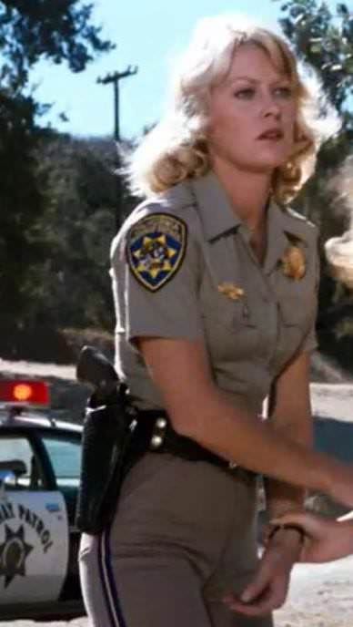 Randi Oakes 80s Cop, Women In Uniforms Police, Blonde Police Woman, Joan As Police Woman, Sheriff Costume, 70s Police Officer, The Police 80s, Cop Outfit, Military Female