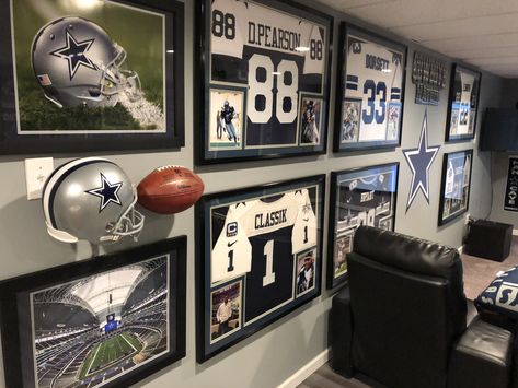 Dallas Cowboy Man Cave Ideas, Framed Jerseys On Wall Ideas, Sports Tv Room, Framed Jerseys On Wall, Dallas Cowboys Man Cave Ideas, Football Man Cave Ideas, Sports Garage, Rich Office, Man Cave Ideas Sports