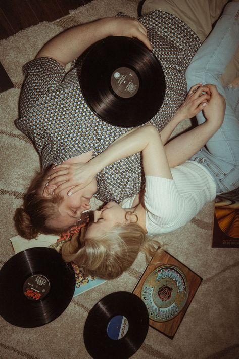 Playful Indoor Engagement Photos in Denver | The couple lies on the floor surrounded by vinyl records for their groovy engagement photos at Disco Den in Denver. See more fun engagement photos retro, retro inspired engagement photos, denver engagement pictures and denver colorado engagement photos. Book McKenzie for your unique engagement session and wedding photography at mckenziebigliazzi.com! Retro Engagement Photos, Colorado Mountain Engagement Photos, Indoor Engagement Photos, Aesthetic Engagement, Engagement Themes, Colorado Engagement Photos, Engagement Session Posing, Fun Engagement Photos, Unique Engagement Photos