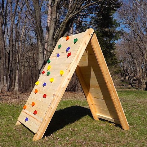 How to Build a Kids Climbing Wall (DIY) | Family Handyman Kids Rock Climbing, Diy Climbing Wall, Climbing Wall Kids, Ninja Course, Bouldering Wall, Kids Climbing, Climbing Holds, Suspension Training, Rock Climbing Wall