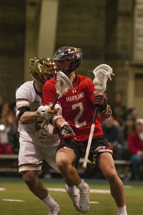 Maryland middie Bubba Fairman working against a Notre Dame defender. Maryland Lacrosse, College Lacrosse, Lacrosse, Notre Dame, Maryland, Utah, Hockey, Ice Hockey