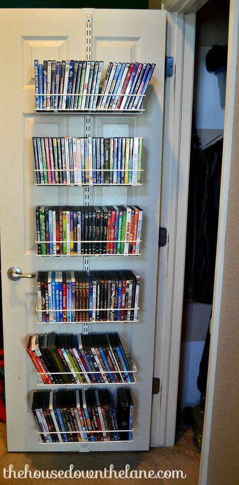 This DIY Movie Storage for Small Spaces project is a little time intensive, but it makes up for it in space and organization gained! | The House Down the Lane How To Organize Dvd Collection, Movie Organization Ideas, Movie Storage Ideas, Vhs Storage Ideas, Dvd Organization Ideas, Small Space Book Storage, Diy Dvd Storage Ideas, Vhs Storage, Dvd Storage Ideas