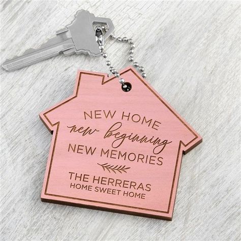 * Personalize with any two lines of text * Reverse engraving technique highlights design * Includes 4.5 ball chain * Measures 3.75 W x 2.5 H * Constructed of pink-stained alderwood * Wipe clean * Made in USA  The New Home, New Memories Personalized Wood Keychain will be a perfect accessory for any new homeowner. This wood keychain can be given as a housewarming gift or just because! New House Keys Aesthetic, Tool Shed Organizing, Cozy Cottage Kitchen, Real Estate Marketing Strategy, Personalized Keychains, Real Estate Agent Marketing, Custom Keychains, Personalized Housewarming Gifts, Laser Engraved Ideas