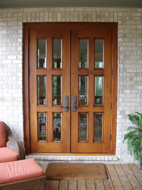 Front Door Colors for Brick Houses | Top Front Door Color Choices. Stained wood front door with glass. Light brick house. green porch plants with seating. Wood front porch. Wooden French Doors Entrance, Wood Patio Doors, Wooden Patio Doors, Doors Aluminium, French Front Doors, Exterior Door Designs, Wood French Doors, Sliding French Doors, Wooden Window Frames