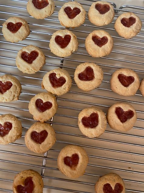 Soft Baking Aesthetic, Valentines Day Aesthetic Food, Fresh Baked Goods Aesthetic, Baking Date Night Aesthetic, Cute Valentines Baked Goods, Baked Good Aesthetic, Thumbprint Cookies Aesthetic, Baking Aethestic, Heart Shaped Cookies Aesthetic