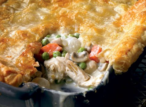 We cut the calories and fat in a classic chicken pot pie recipe by substituting in puff pastry for a lighter meal that still packs a traditional taste. Classic Chicken Pot Pie Recipe, Healthy Chicken Pot Pie, Easy Chicken Pot Pie, Eat This Not That, Pot Pies Recipes, Chicken Pot Pie Recipes, Favorite Comfort Food, Chicken Pot, Chicken Pot Pie