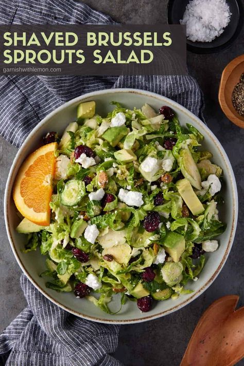 Not a brussels sprouts fan? This make-ahead shaved sprouts salad will change your mind! Hearty shredded brussels sprouts are mellowed with a tangy citrus vinaigrette. Craisins, feta cheese, pistachios and avocado round out the sweet and savory flavors in every bite. Perfect side dish for the holidays or even a weeknight meal! Salad With Citrus Vinaigrette, Shaved Brussel Sprout Salad, Shredded Brussel Sprout Salad, Salad With Citrus, Shredded Brussels Sprouts, Shaved Brussel Sprouts, Brussels Sprouts Salad, Citrus Recipes, Citrus Vinaigrette