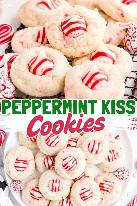 These candy cane kiss cookies are the holiday version of everyone’s favorite, peanut butter blossom cookies. Instead of a peanut butter cookie, they are peppermint sugar cookies and instead of a chocolate kiss, they are topped with a delicious Hershey’s Candy Cane Kiss. They are one of our favorite Christmas cookies of all time! Snickerdoodle Cookies With Hershey Kiss, Hersheys Candy Cane Kisses Recipes, Sugar Cookies With Peppermint Kisses, Hersheys Peppermint Kiss Cookies, Christmas Cookies Peppermint Kiss, Candy Cane Thumbprint Cookies, Candy Kisses Ideas, Candy Cane Peppermint Cookies, Red Velvet Peanut Butter Blossoms