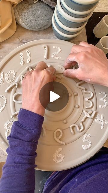 Deana Coveney on Instagram: "Here is the process of creating a ceramic wall clock by hand, from raw clay to a glossy high-fired functional clock. I love the glossy finish and the rainbow colors on the numbers. 
The round shape is first thrown on the pottery wheel using white stoneware clay,  spreading and forming the clay in a similar way to creating a large platter. Then I add the sculpted numbers one by one. This stage requires a veeeeeery slow drying time so that the clay doesn’t crack as it dries and shrinks. After bisque firing the piece to harden it, I color the numbers and apply glaze. One more firing to 2200 degrees F and it’s finished. Almost…! Last, I add the actual clock mechanism and the hands to the clock face as well as some batteries that will run it (the mechanism is behind Ceramic Wall Clock, Pottery Clock, Clay Clock, Handmade Clocks, Run It, Pottery Wheel, Clock Mechanism, Clock Face, Wood Board