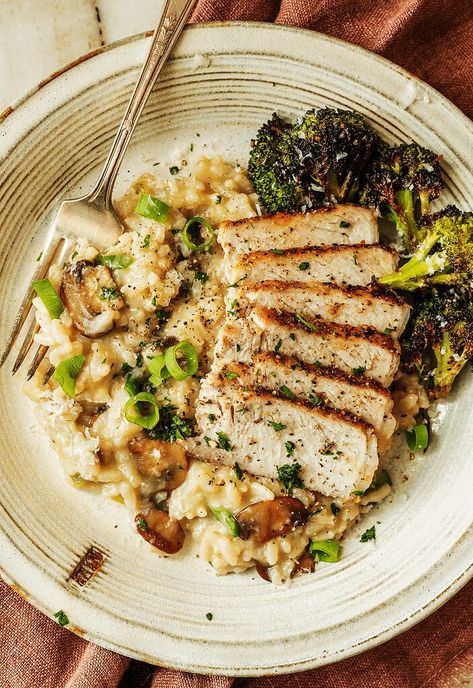 These pork chops are served with a luxurious mushroom-scallion risotto for an easy, filling dinner. The post Pork Chops with Mushroom-Scallion Risotto appeared first on Tried and True Recipes. Pork Mushroom, Mushroom Pork Chops, Mushroom Risotto Recipes, Tried And True Recipes, Juicy Pork Chops, Filling Dinner, Roasted Chicken Breast, Mushroom Risotto, Risotto Recipes