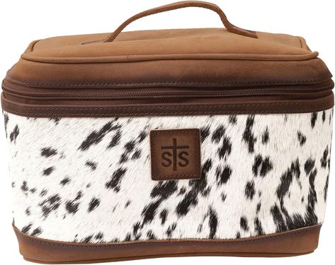 Brand	STS Ranchwear
Color	Tornado/Cowhide
Material	Other
Style	Cowhide Train Case Durable Spacious Versatile Leather Travel Cosmetic Bag With Top Handle
Closure Type	Flap, Zipper

“As an Amazon Associate I earn from qualifying purchases.” One Size Beauty, Classic Equine, Western Bag, Leather Makeup Bag, Train Case, Travel Cosmetic Bags, Leather Travel, Cute Bags, Tornado