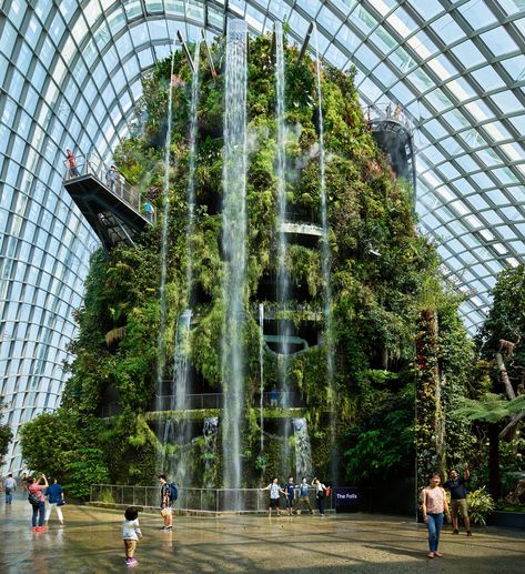 Eight buildings that incorporate waterfalls Waterfall Architecture Design, Waterfall Building Architecture, Building Waterfall, Solar Punk Architecture, Waterfall Architecture, Sustainable Communities, Waterfall Building, Jewel Changi Airport, Changi Airport Singapore