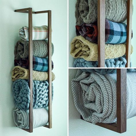 If you don't have any floor space, a great way to add extra storage is to look at your walls for room. A blanket shelf attaches to your wall and holds your blankets, rolled up, until you need them. This is also a great way to show off your blanket collection. #BlanketShelf #BlanketStorage #HomeDecor #ModernDecor Blanket Holder Wall, Blanket Storage For Nursery, Storage Ideas For Throw Blankets, Organize Blankets In Closet, Throw Blanket Holder, Nursery Blanket Storage Ideas, Storage For Blankets And Comforters, Rustic Blanket Storage, Blanket Storage Kids Room