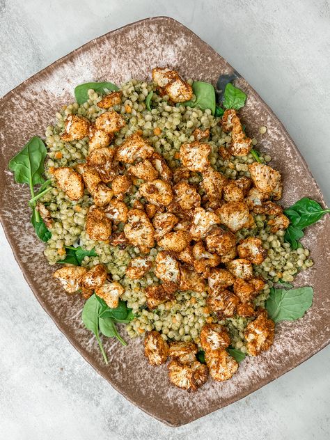 Air Fryer Cauliflower + Pesto Pearl Couscous Salad Pearl Couscous Meals, Pesto Couscous, Couscous Pearl, Lamb Pita, Pesto Pearl Couscous, Cauliflower Pesto, Pearl Couscous With Mushrooms, Moroccan Cauliflower And Couscous Salad, Vegan Pesto Sauce