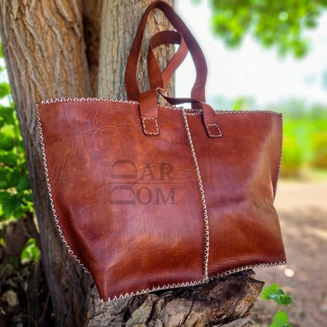 Leather Bag Handmade Bag Brown Bag ## Product Characteristics ## - Dimension :(12.40H * 16.14W* 4.13D)inch [ 31.5x41x10,5cm] -Color : Brown -Material: 100 % genuine leather -100% Handmade This bag is handcrafted from high quality goat leather. The leather we use is treated with natural materials that make the leather has no unpleasant smell. This bag is the best choice for you , because it is very comfortable and durable. ##Note ## We still need your phone number for the shipping company can you Leather Bag Handmade, Leather Hobo Bags, Sweet Bags, Handbag For Women, Brown Bag, Unique Bags, Handmade Bag, Leather Gifts, Leather Bags Handmade