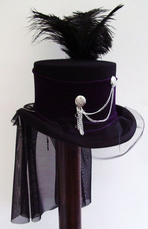 winifred-batby: “The Lady Gailen Githic Riding hat Chained Corset top by Blackpin, £87.00 ” Moda Steampunk, Steampunk Black, Steampunk Top, Mode Steampunk, Purple Gothic, Steampunk Top Hat, Victorian Hats, Mad Hatter Hats, Steampunk Hat