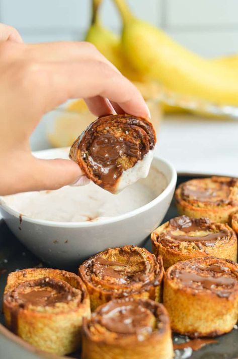 Dipping a peanut butter banana bite in yogurt dip. Peanut Butter Banana Tortilla Air Fryer, Peanut Butter Banana Roll Up, Air Fryer Banana Recipes, Peanut Butter Roll Ups, Banana Roll Ups, Air Fryer Banana, Cottage Cheese Dips, Banana Roll, Cleaner Eating