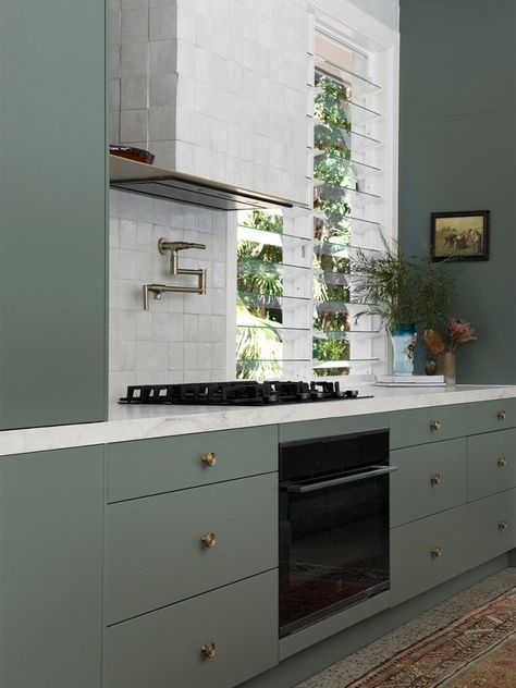 Sage Green Kitchen, Black Appliances, Green Kitchen Cabinets, Interior Windows, Green Cabinets, New York Apartment, Kitchen Cabinet Colors, Cabinet Colors, Green Kitchen