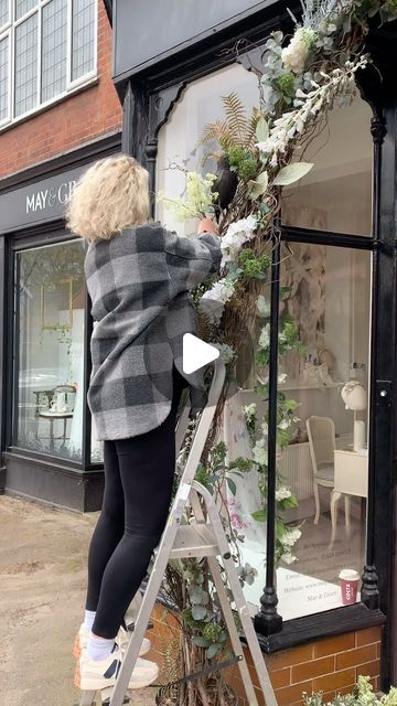 Visual Merchandiser /Interior Stylist/ Artist /Murals on Instagram: "FLORAL ARCH INSTALLATION   I’ve absolutely loved installing this arch for @mayandgracebridal in Haslemere.   There is nothing more magical than foxgloves and poppies! I was so excited looking for the right faux flowers for this Instillation. It had to be high quality and work perfectly with the insanely beautiful dresses!   Can’t wait to transform the rest of the shop!   #wedding #weddingdress #weddinginspiration #weddingdecor #weddingideas #windows #fauxflowers #flowers #wildflowers #creativedesign #creativeprocess #flowerarch #flowerpower #retail #highstreet #vm #visualdisplay #display #windowdisplay #haslemere #surreybusiness #surreyweddings" Florist Window Display, Arch Installation, Boutique Store Displays, Vintage Booth Display, Plant Display Ideas, Vintage Booth, Visual Merchandiser, Booth Display, Floral Arch