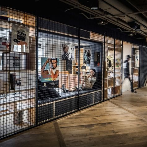 At this music library of @universalmusic in The Netherlands, we added outdoor fence slates to give the space an urban vibe. Music is something you listen to anywhere and the mix of album covers, lounge seatings and these cool materials, create a vibrant setting for music lovers. Vibe Music, Outdoor Fence, Universal Music Group, Music Library, Lounge Seating, Office Interior, Office Interior Design, Music Is, Music Lovers