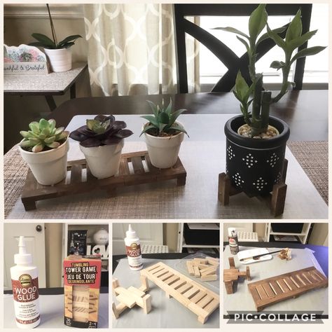 My DIY plant stand. I took a Dollar Tree Tumbling wood blocks, glued them together and painted it. I thought I would make a plant stand for my succulents & bamboo plant. Hanging Outdoor Decor Ideas, Jenga Block Plant Stand Diy, River Rock Art Diy Projects, Dollar Tree Diy Wood Crafts, Things To Do With Jenga Blocks, Plant Risers Ideas, Jenga Block Plant Stand, Diy Dollar Tree Plant Stand, Jenga Diy Crafts