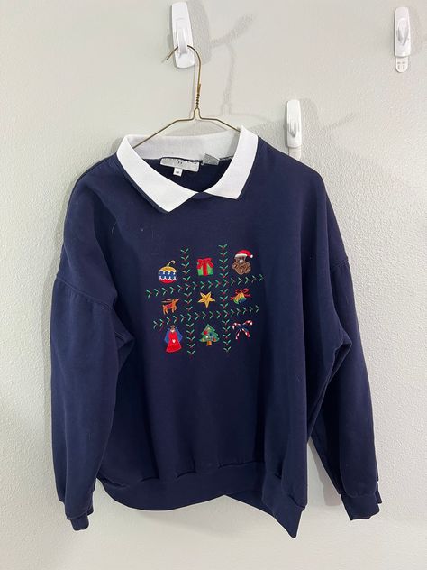 Get into the holiday spirit with this vintage Highgate II Christmas sweater in a beautiful blue color. The tight-knit fabric and collared neckline make it perfect for a casual occasion, while the embroidered accents and pullover style add a touch of elegance. This sweater is available in size 1X, with a regular fit and long sleeves, making it suitable for plus-size women.  The sweater is perfect for any season, be it winter, summer, fall, or spring, and is sure to make you stand out with its uni Christmas Sweater Outfits, Vintage Christmas Sweater, Dog Lover Sweatshirt, 90s Clothes, Vintage Christmas Sweaters, Christmas Pullover, Dog Mom Sweatshirt, Christmas Clothes, Upcycle Sweater