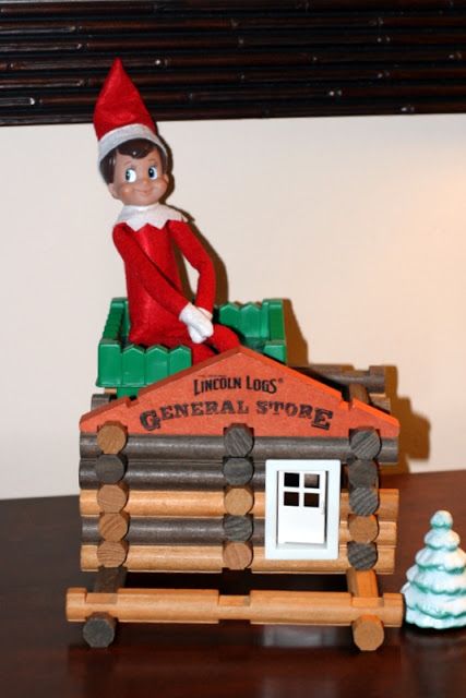 we have lincon logs, I have no problem bringing old school back ;) Logs Ideas, Mantlepiece Decor, Elf Idea, Elf Jewelry, Elf On The Shelf Idea, Shelf Elf, Elf Sweater, Elf Decorations, Lincoln Logs