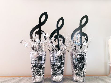 Music centerpieces Music Birthday Party Centerpieces, Music Inspired Table Decor, Music Inspired Centerpieces, Marching Band Centerpieces Table Decorations, Music Table Centerpieces, Music Theme Table Decor, Band Banquet Centerpieces, Music Centerpieces Ideas, Music Table Decorations