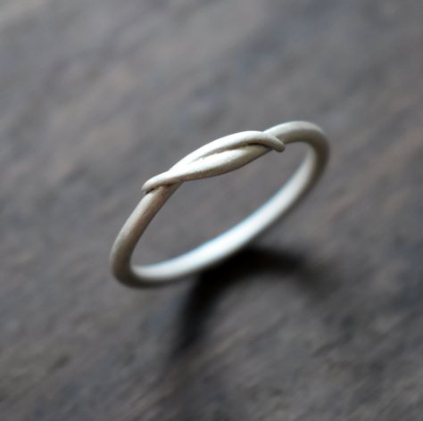 "Sterling silver twist ring, which I name \"Entwined\", custom made to order in your size from 100% Recycled Sterling Silver. This ring is handmade here in my Scottish jewellery studio. I start with 1.8mm diameter sterling silver wire, then begin filing and forming it into this beautiful, flowing, twist style ring using my hand tools and traditional silversmithing techniques. The ring is soldered closed, so is not adjustable. It is given a satin finish, which glows softly and beautifully. Please Silver Wire Rings, Silversmithing Jewelry, I Name, Jewellery Studio, Scottish Jewellery, Silver Rings Simple, Handmade Sterling Silver Rings, Twist Style, Silver Jewelry Design