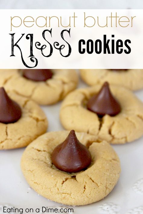 Try this delicious Peanut Butter Kiss Cookies Recipe. They are easy to make, fun to make with the kids, and very frugal to make. - Eating on a Dime Christmas Cookies Peanut Butter, Easy To Make Christmas Cookies, Peanut Butter Kiss Cookies Recipe, Kiss Cookies Recipe, Kiss Cookie Recipe, Peanut Butter Kiss, Peanut Butter Kiss Cookies, Cookies Peanut Butter, Cookie Exchange Recipes