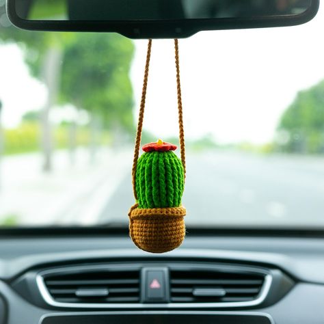 PRICES MAY VARY. Unique Design: This Crochet Car Ornament features a unique design that is 100% handmade using high-quality cotton yarn, with a careful and elaborate color matching process to ensure there are no color differences. Safe and Convenient: The ornament is made of soft cotton thread and won't make any noise or cause any damage to your car's glass if it hits it. You can easily adjust the length of the rope according to your car's environment to ensure it won't affect your driving line Crochet Car Ornament Free Pattern, Crochet Car Ornament, Crochet Plants, Boho Basket, Mirror Accessories, Crochet Car, Rear View Mirror Accessories, Hanger Storage, Mirror Hangers