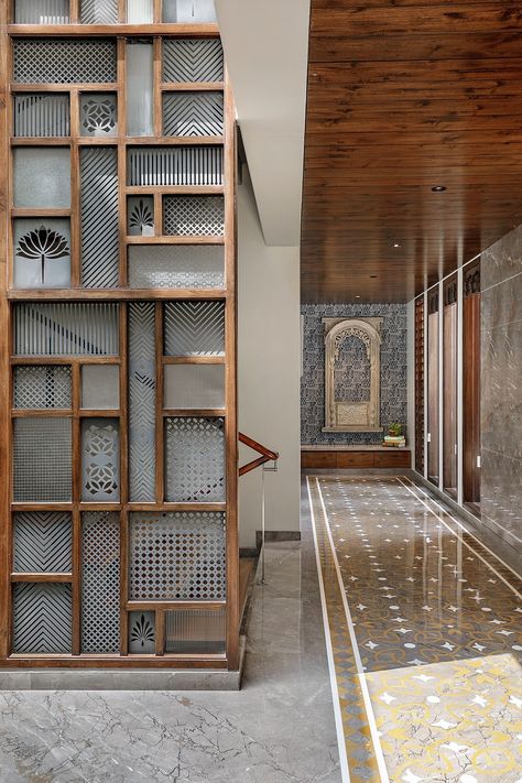 This Vadodara bungalow embraces a grey colour palette with jali work | Architectural Digest India Ms Jaali Design, Jali Work Design, Partition Wall Design Modern Interiors, Jali Partion Design, Mandir Partion Design, Ms Partition Design, Mandir Partition Design, Partition Design Wooden, Office Partition Design Wall Dividers