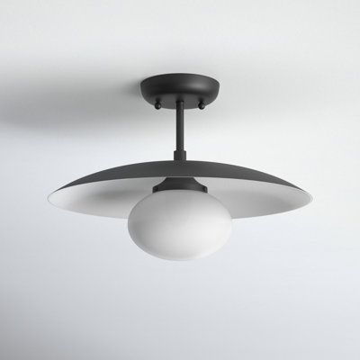 A real glow-getter: When it comes to instantly elevating your space, this semi-flush mount gets the job done. It features a modern canopy design at the end of a slender download. The frosted glass globe gently filters ambient light from the single bulb, and a soft white undercoat adds a polished finishing touch. Plus, it's dimmable for the perfect mood lighting and comes in your choice of finish for versatility. Love this look. Shop the entire collection. Finish: Black | Joss & Main Del Semi Flu Glass Semi Flush Mount Light, Modern Canopy, Glow Getter, Modern Barn House, Canopy Design, Semi Flush Lighting, Mood Lighting, Light Fixtures Flush Mount, Modern Barn